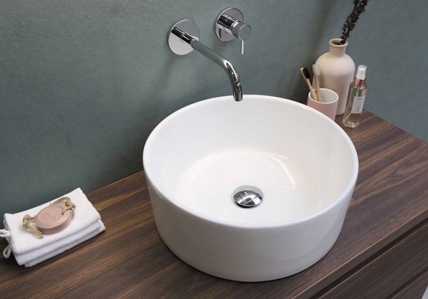 Modern bathroom sink installation by A&A Plumbing